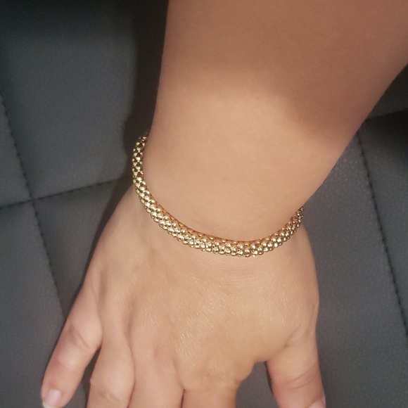 Elastic gold colored fashion bracelet - Picture 3 of 5